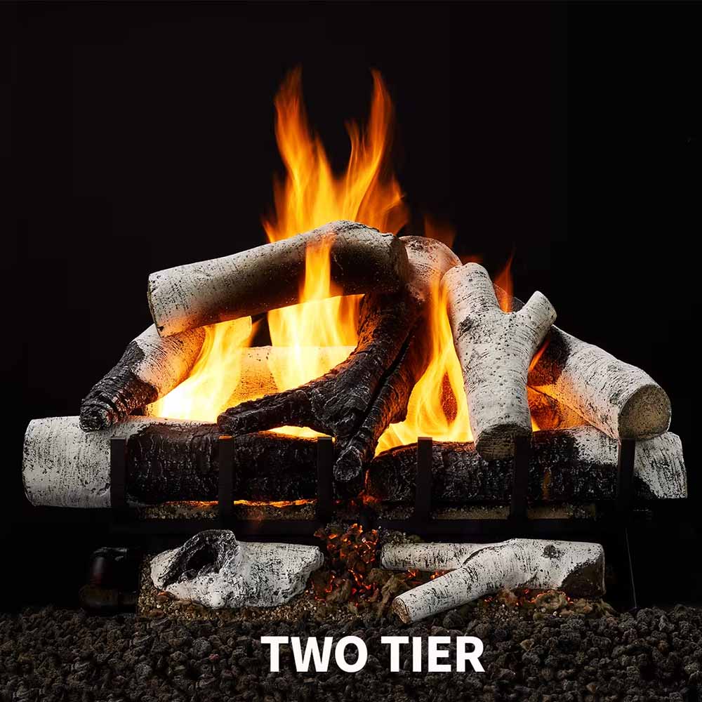 Indoor vented gas log set with two-tier stacked birch logs and flames