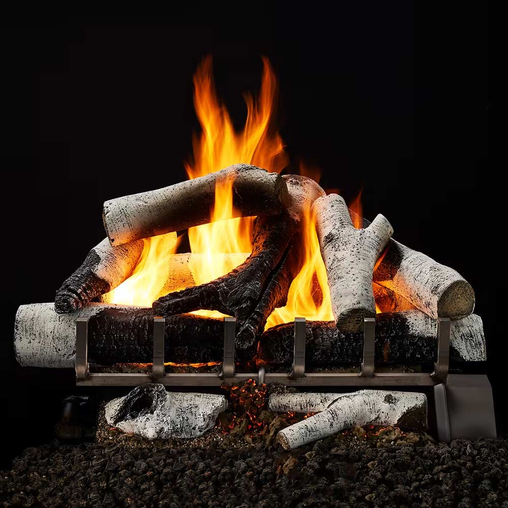 Vented gas log set with faux birch logs, burning flames, and metal grate