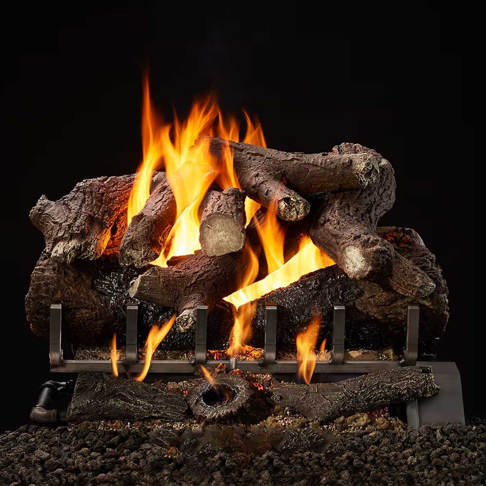 Outdoor vented gas log set with dark split logs and tall flames on a metal grate