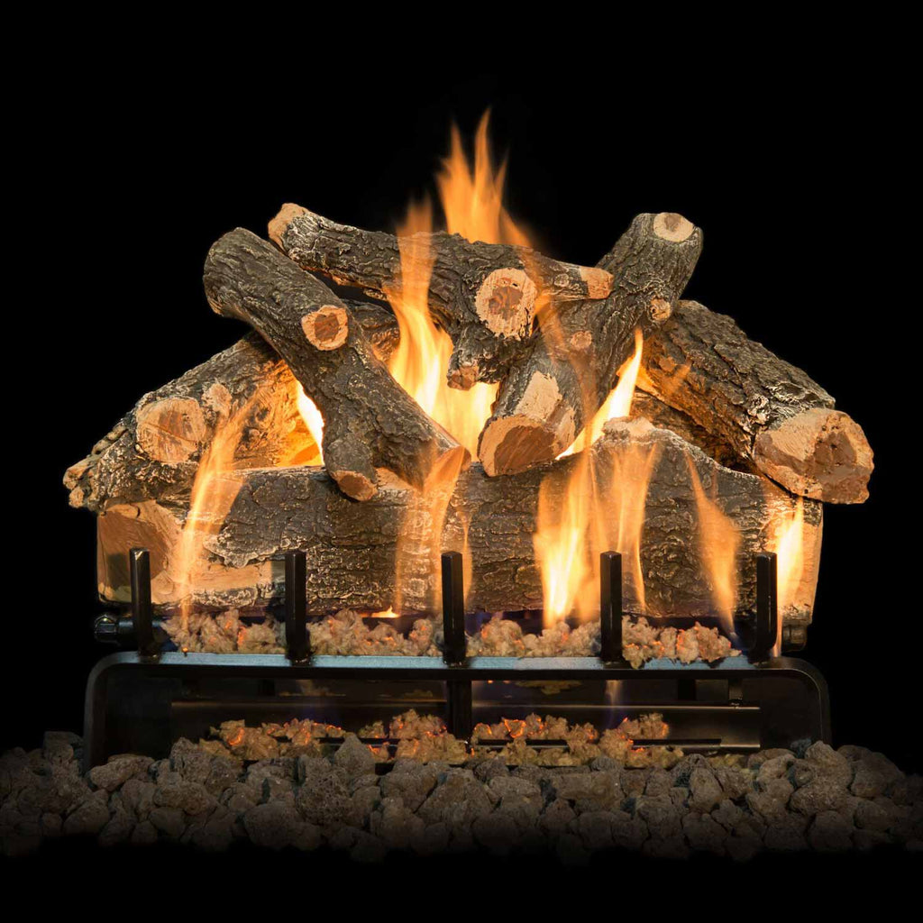Vented gas log set with weathered oak logs and flames