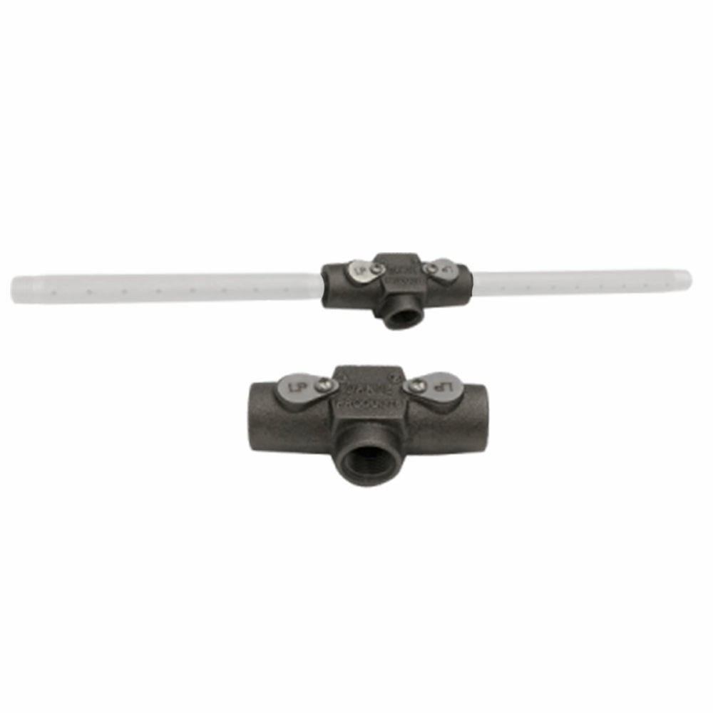Fuel mixer valve with long white tubing, LP/NG markings on dark cast metal housing