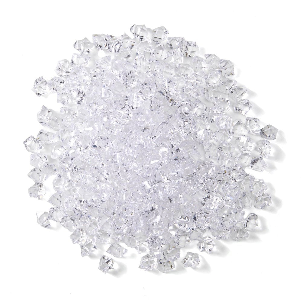 Clear acrylic crystal shards and cubes, scattered pile with faceted faces.