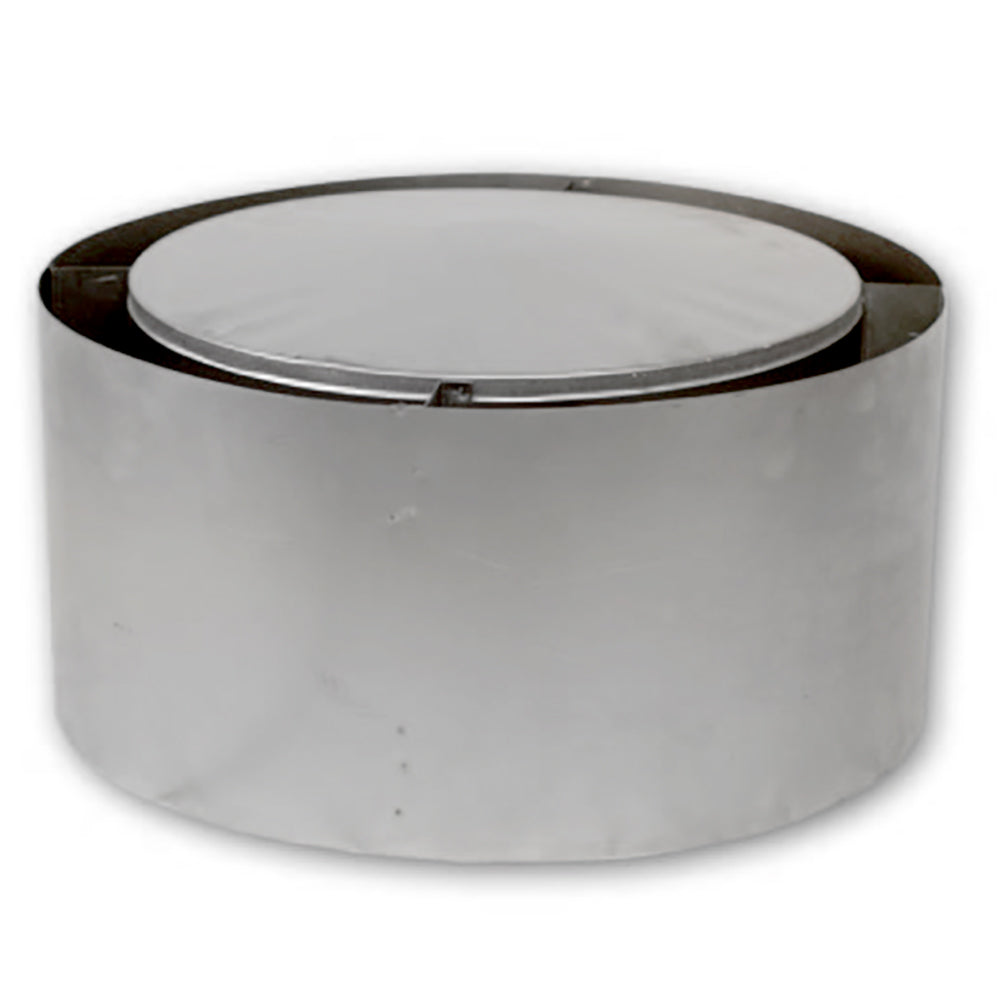 Cast iron fireplace surround kit ring with round opening and dark metal rim
