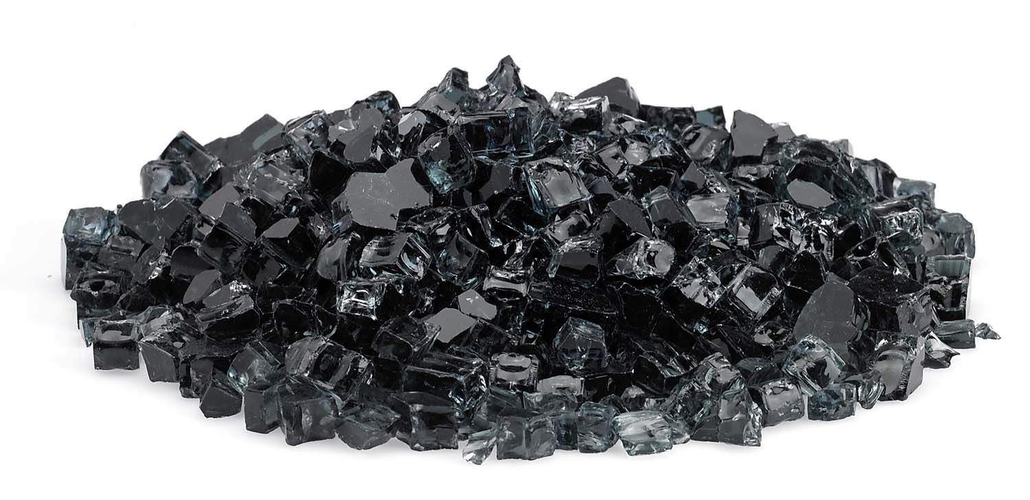 Black fire glass chunks spread in a low mound of crushed glass pieces