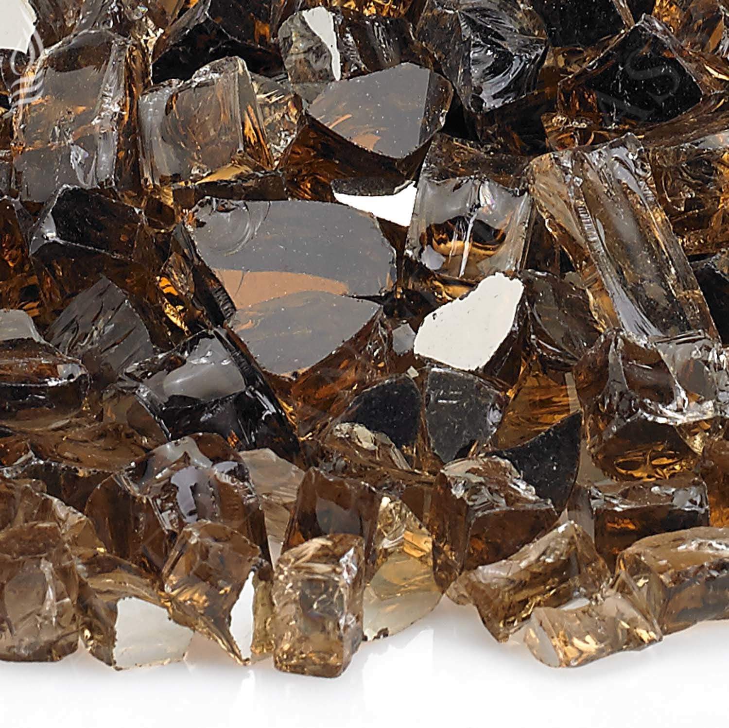 Copper reflective fire glass close-up with faceted dark brown, clear, and amber pieces