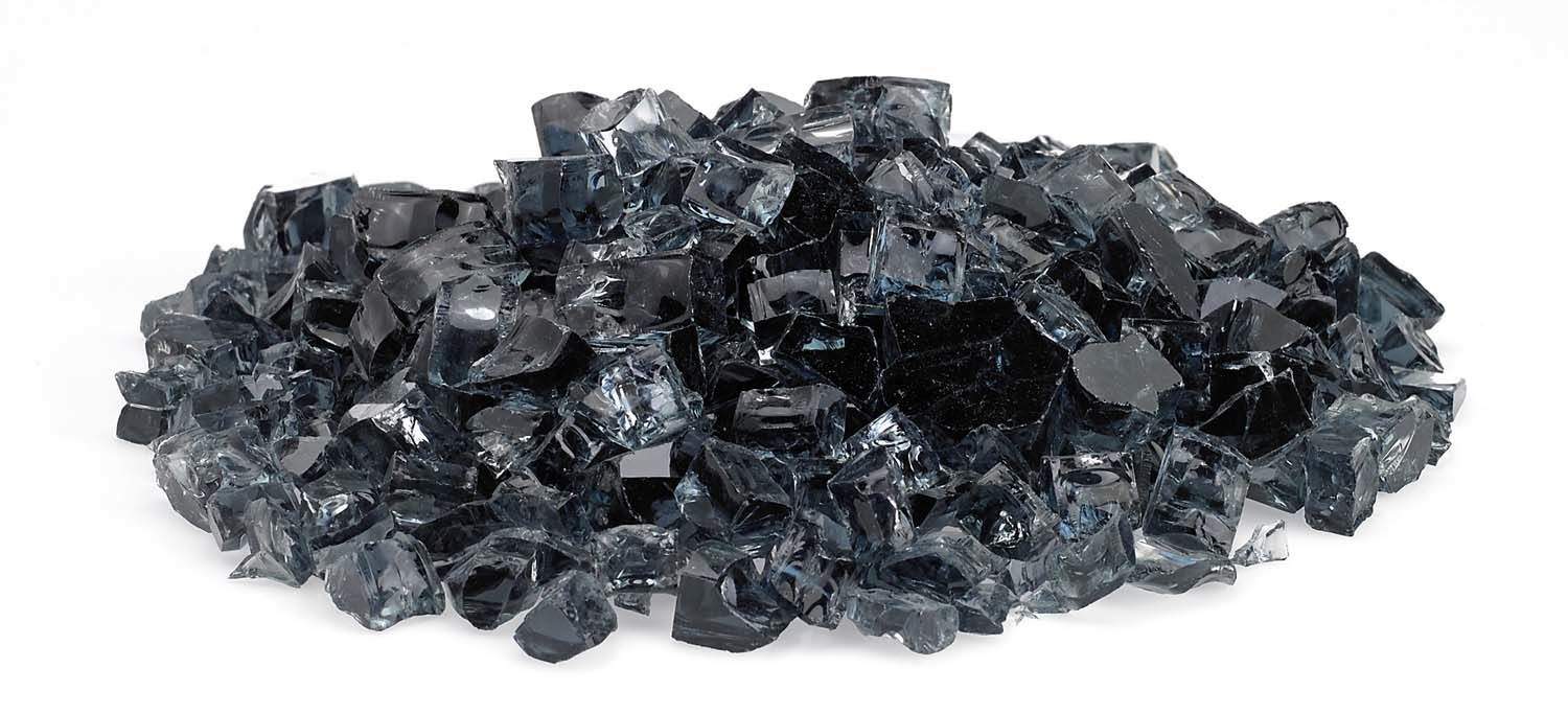 Grey fire glass chunks in a low pile, irregular reflective pieces