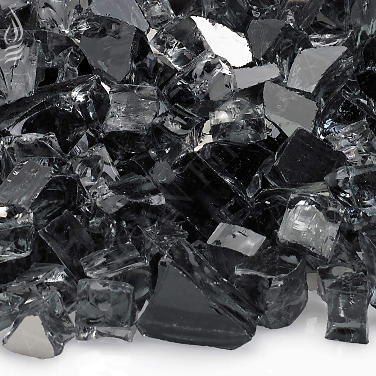 Close-up of grey reflective fire glass chunks with faceted sparkle