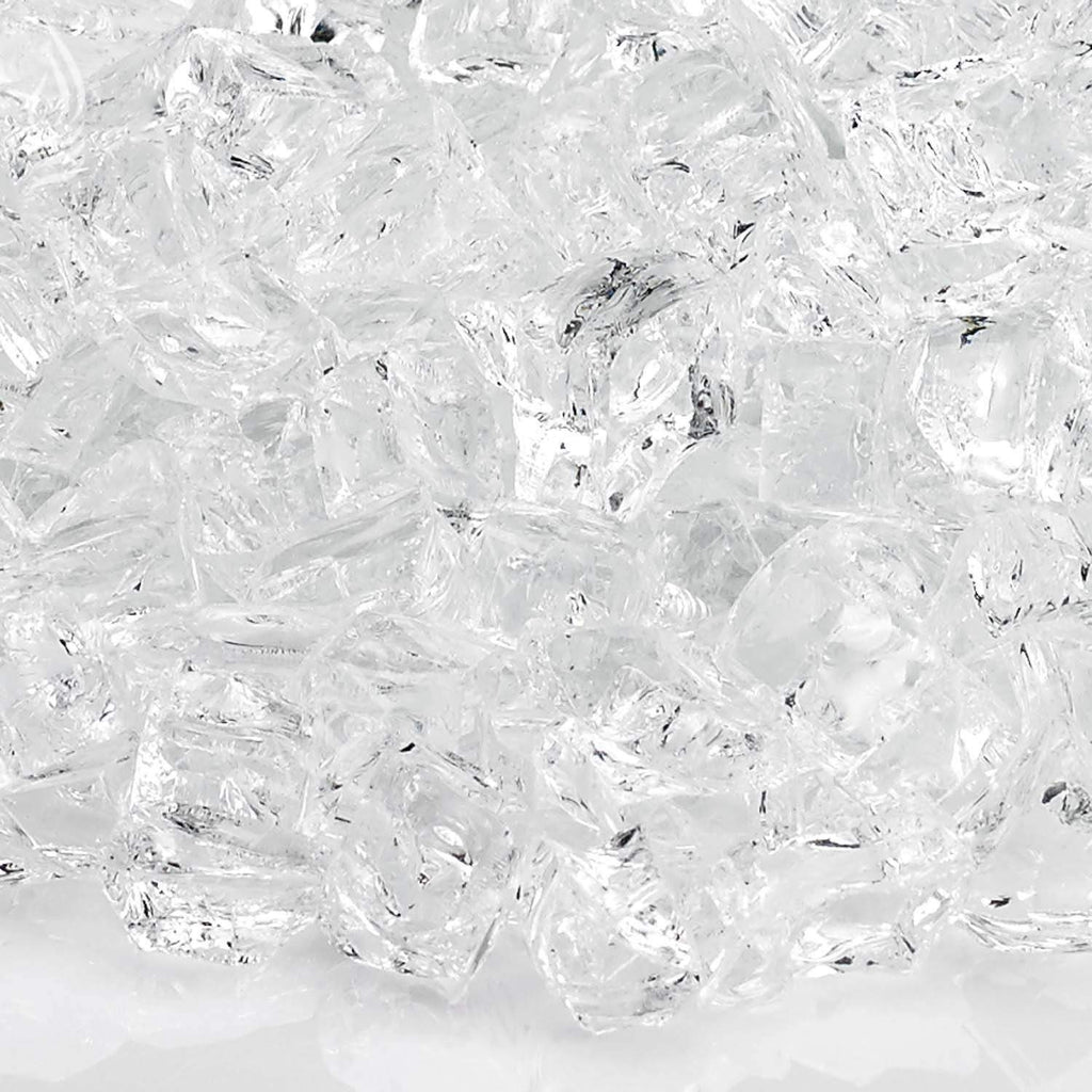 Clear white fire glass shards, close-up of textured glass chunks.