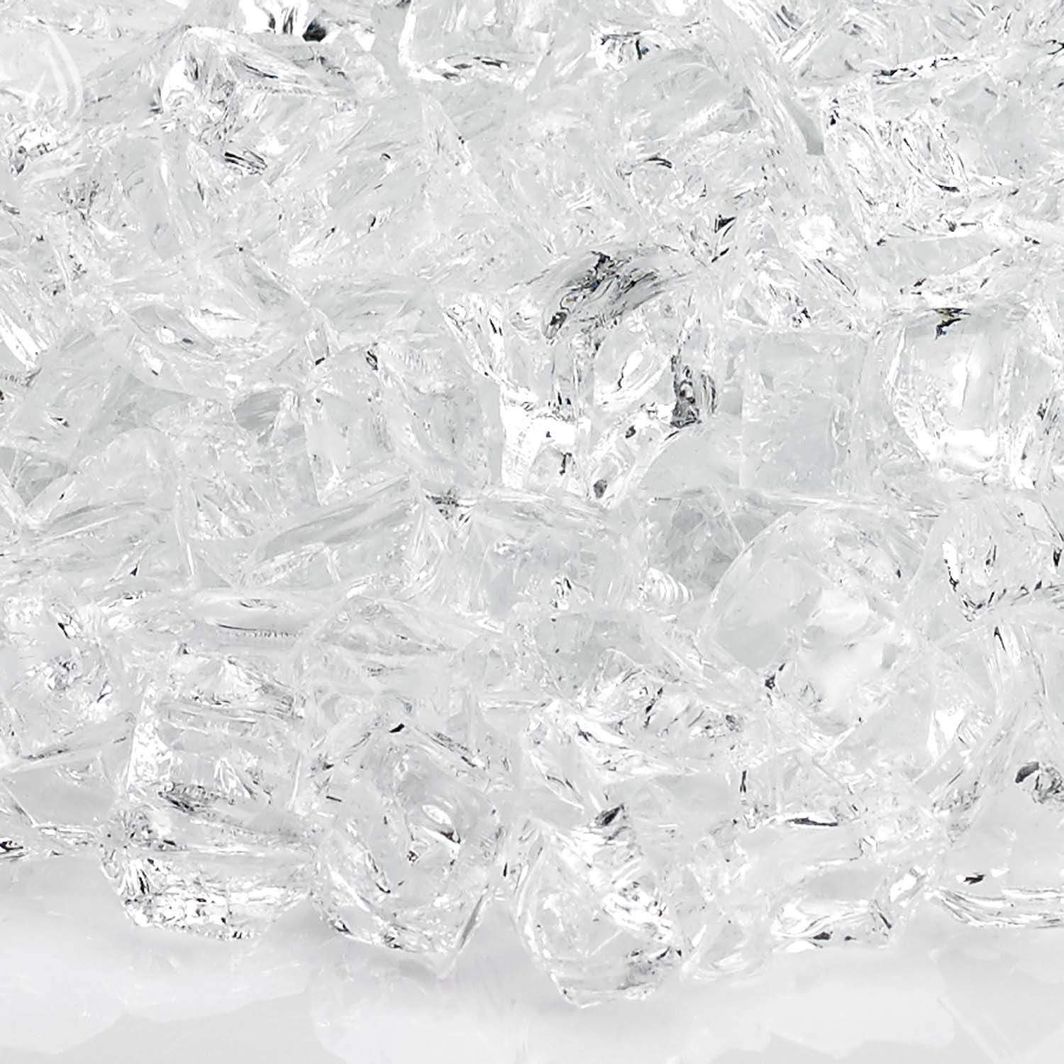 Clear white fire glass shards, close-up of textured glass chunks.