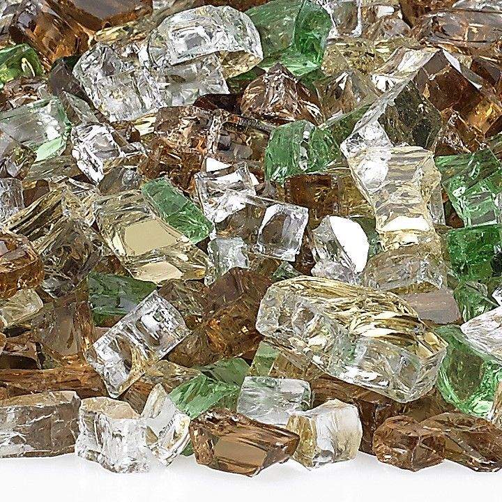 Close-up of reflective fire glass cubes in clear, green, and brown with gold hues