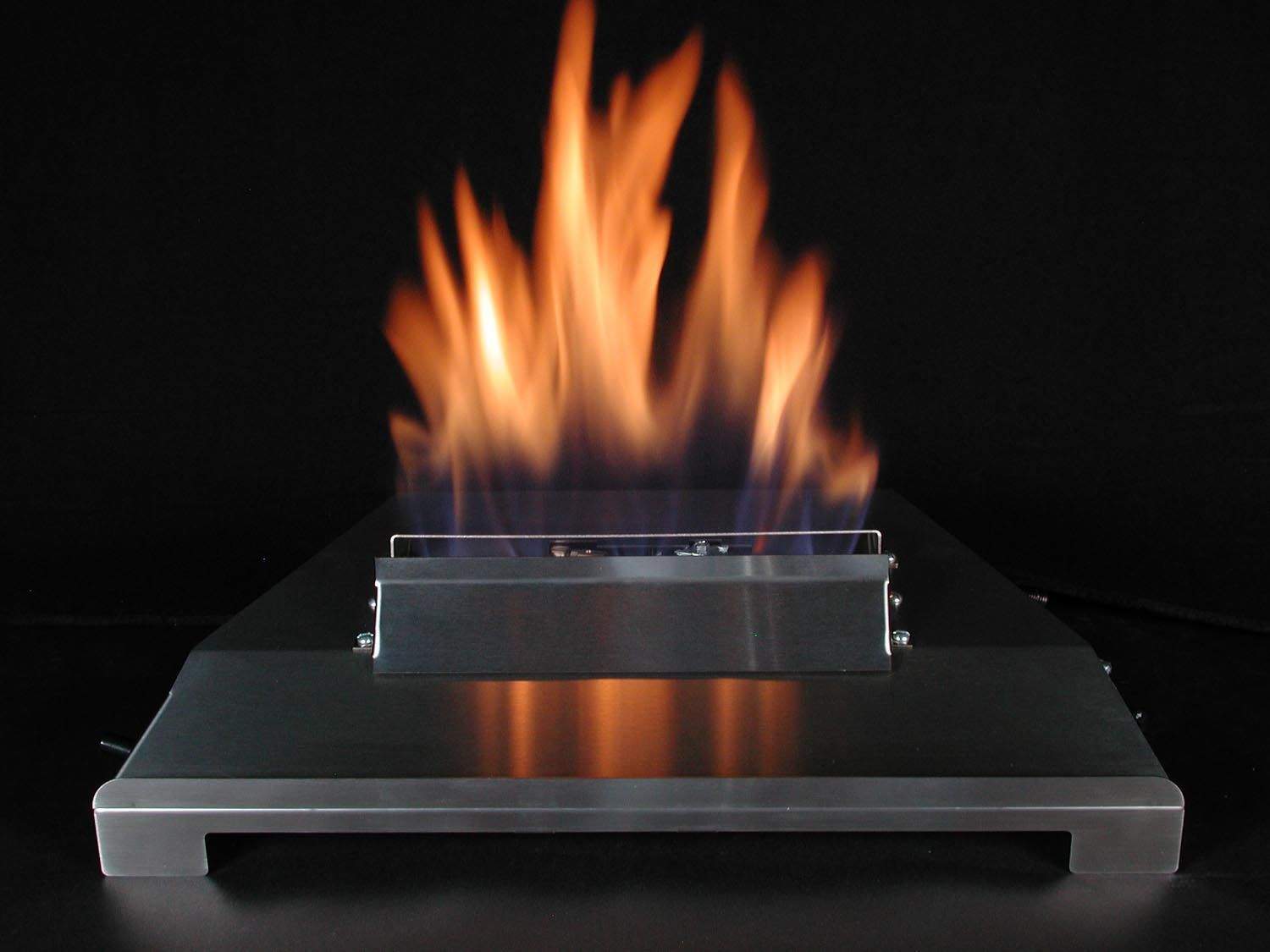 Ventless burner kit with orange flames in a metal firebox