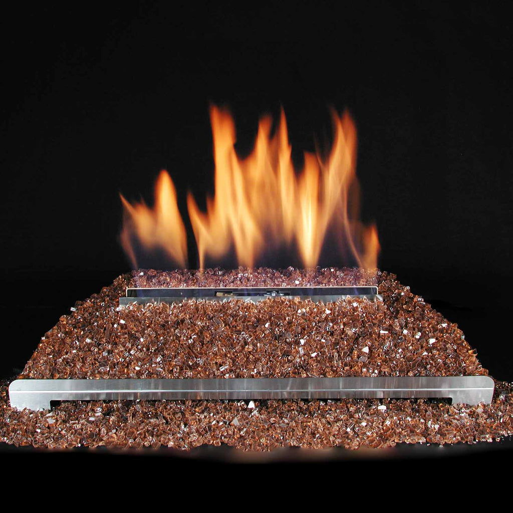 Ventless gas burner with stainless bar over copper fire glass and orange flames