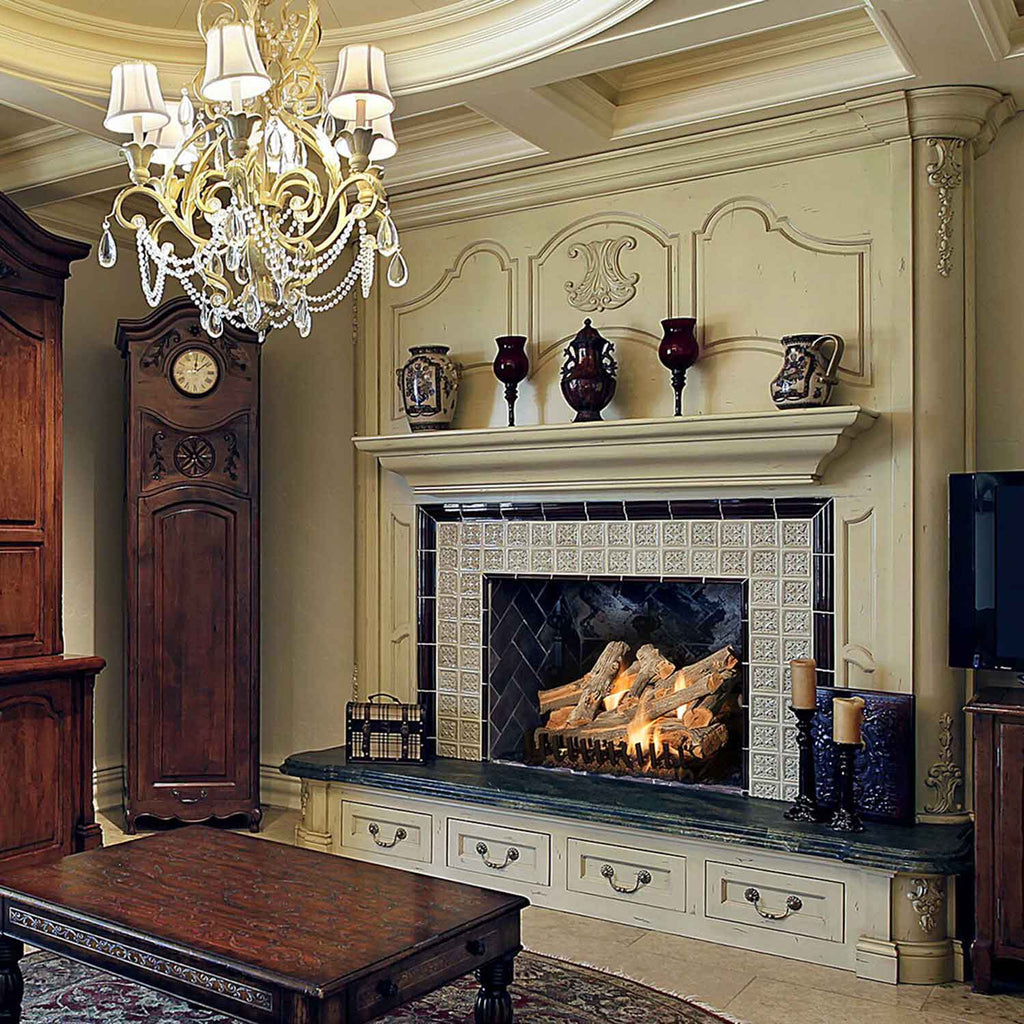 Vented gas log set burning inside decorative fireplace with mantel surround
