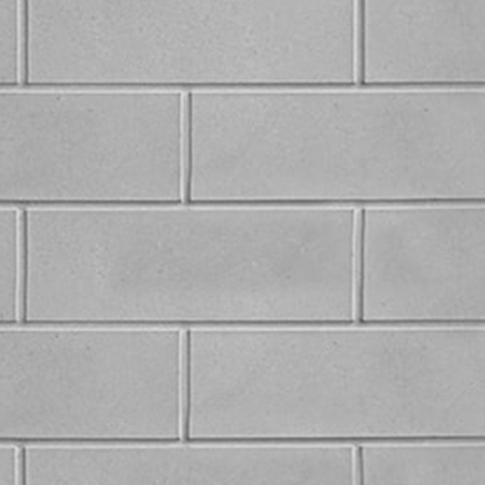 Gray refractory brick extension tiles with rectangular rows and vertical grout lines
