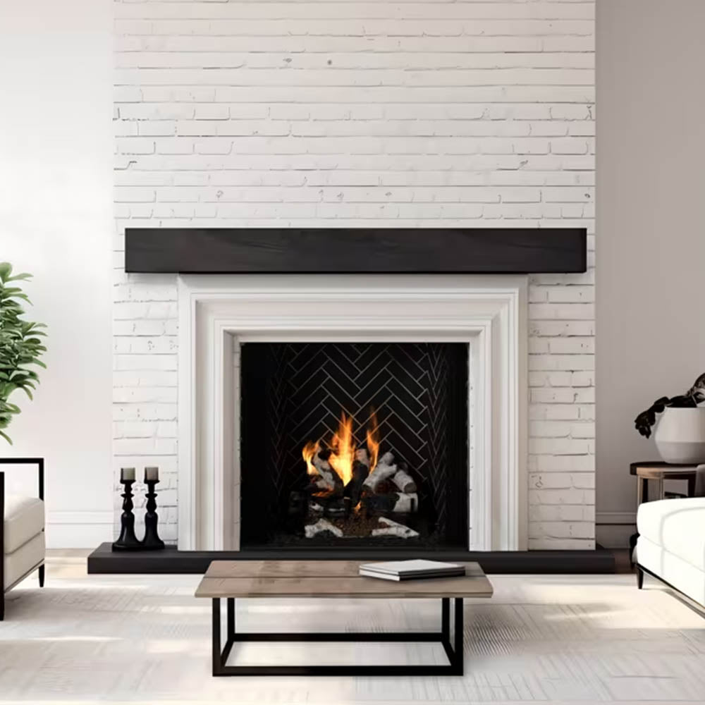 Wood-burning fireplace with white mantel and black firebox, lit fire with logs