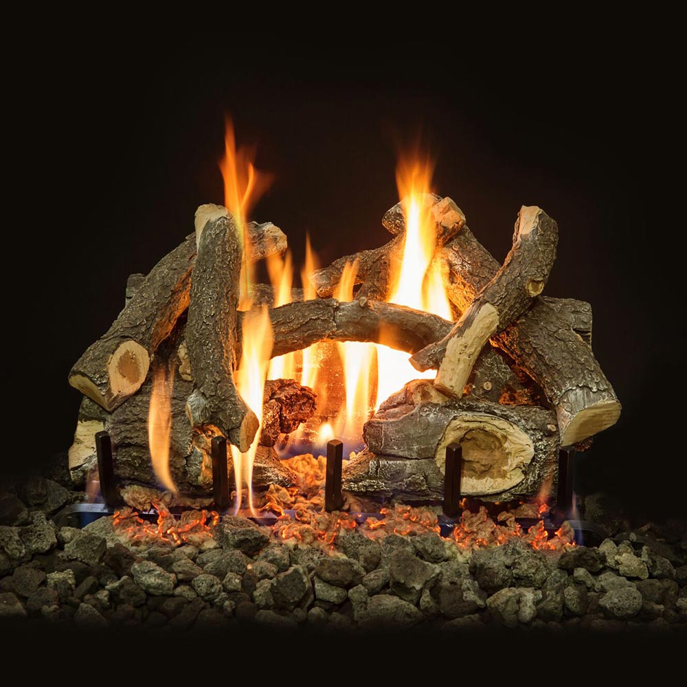 Weathered oak double-sided vented gas log set with burning charred logs and flames