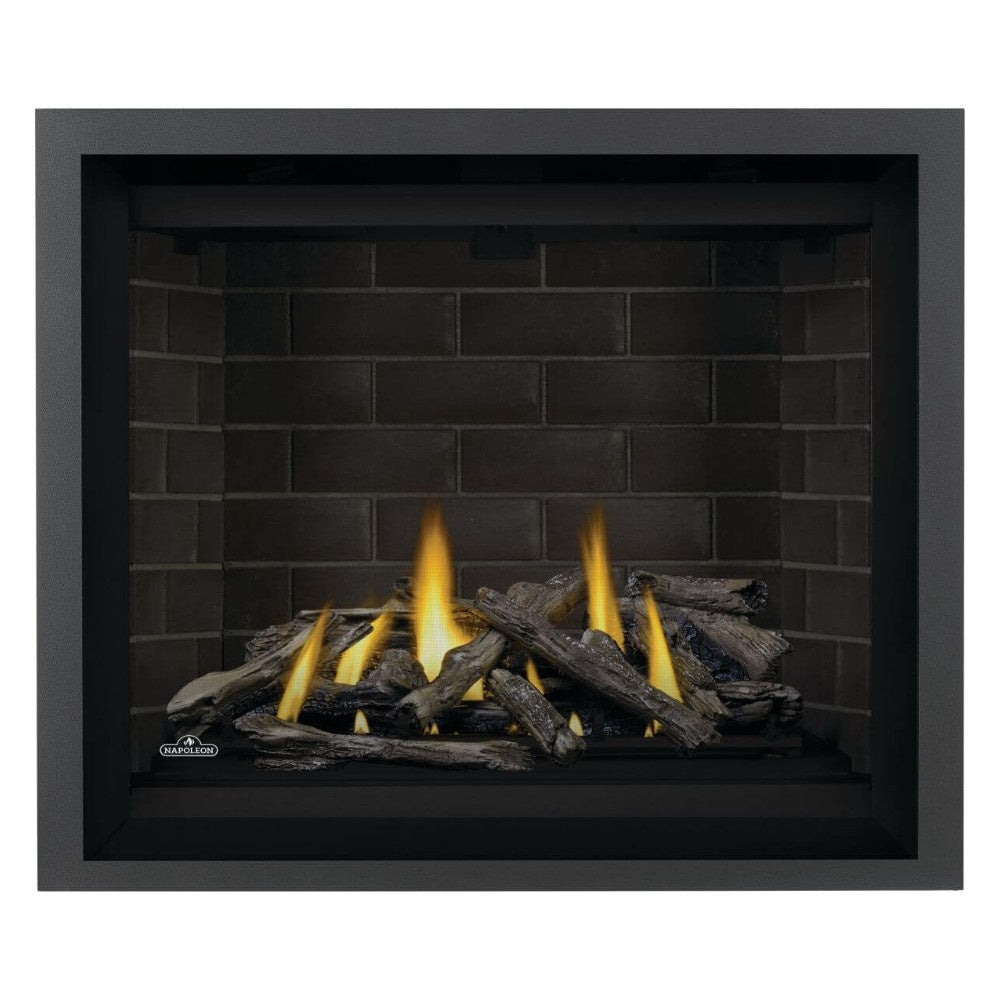 Black direct vent gas fireplace with burning logs and an ember bed in the firebox