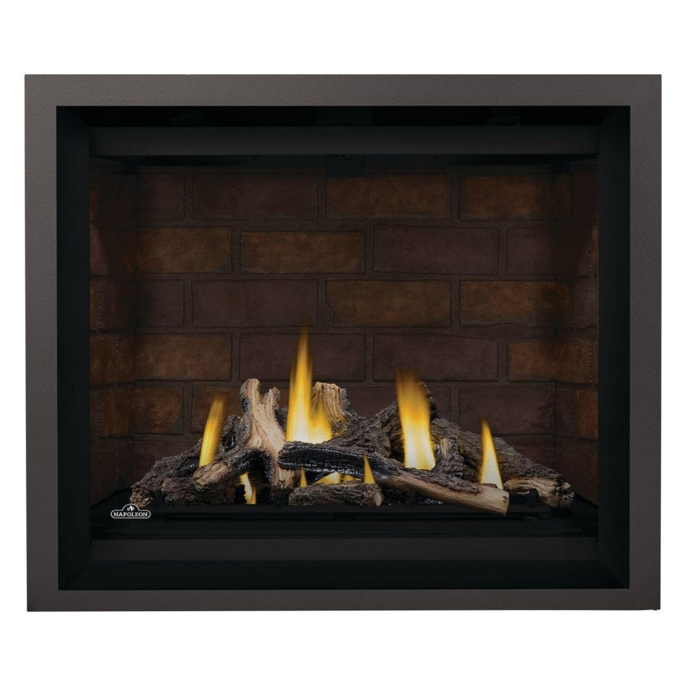 Direct vent gas fireplace with burning logs and flames against brick-pattern backing