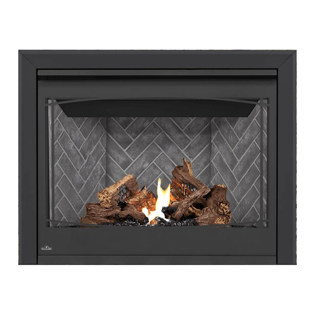 Direct vent gas fireplace with black surround, burning logs, and flames behind gray brick.