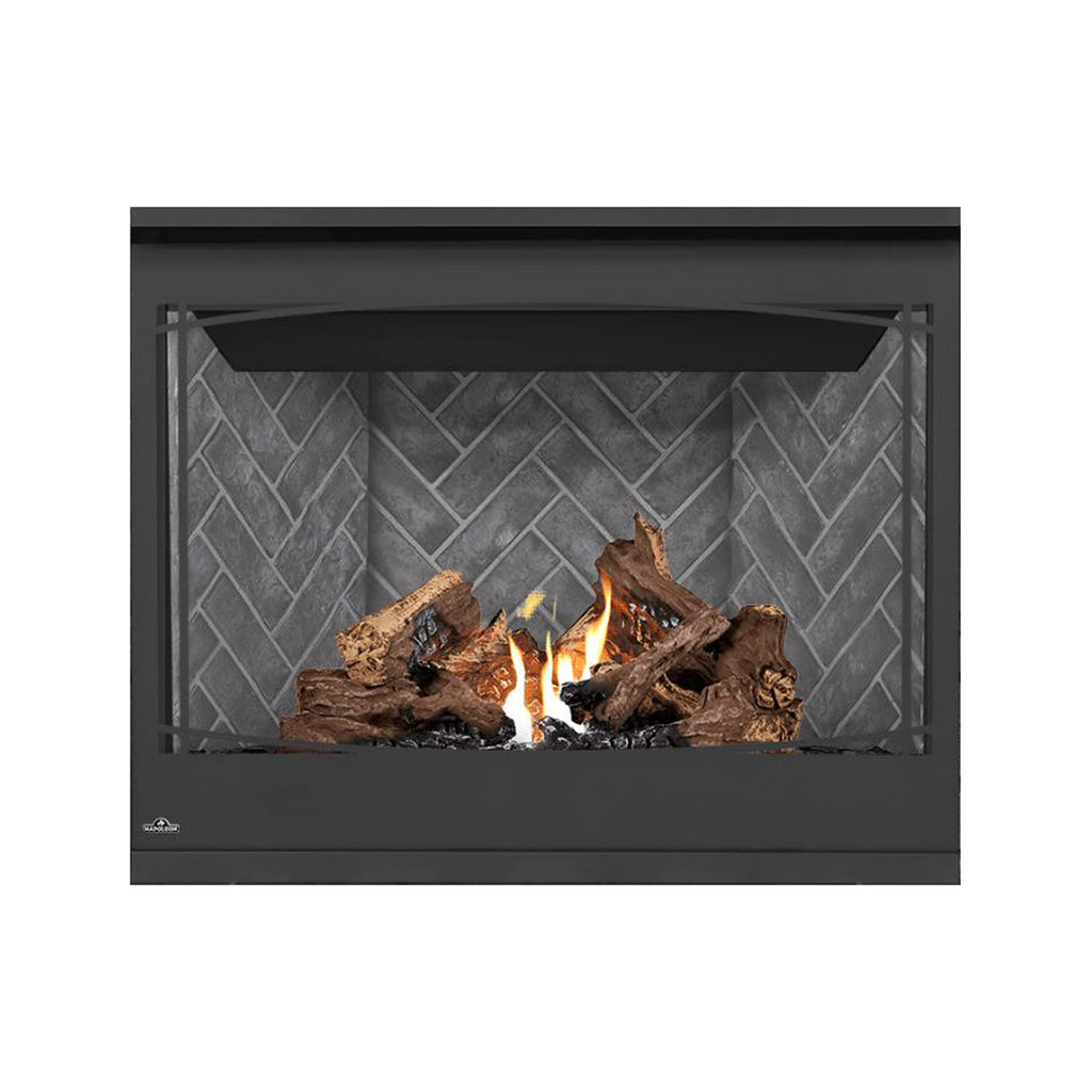 Black direct vent gas fireplace with glass front, flames and stacked logs on gray brick back