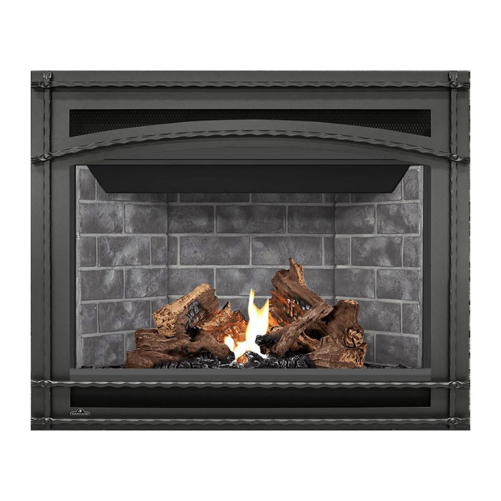 Black direct vent gas fireplace with glass front, visible flames and logs on stone-pattern back