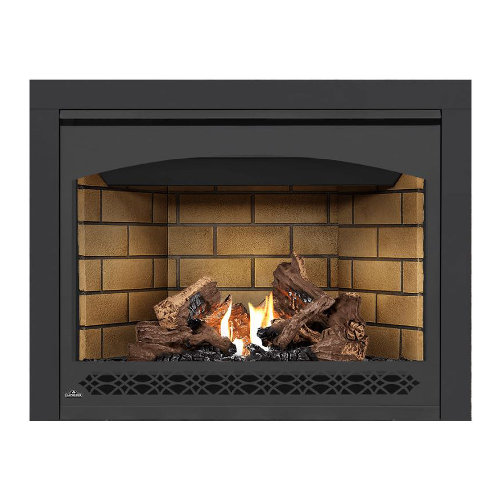 Direct vent gas fireplace with black surround, burning logs, and flames behind tan brick.