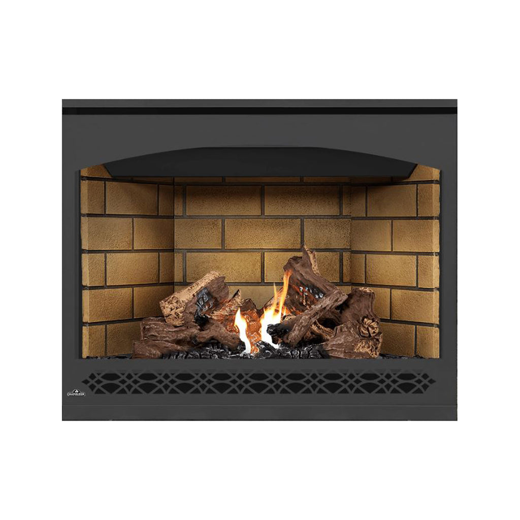 Direct vent gas fireplace with dark frame, glowing flames and tan brick back panel.