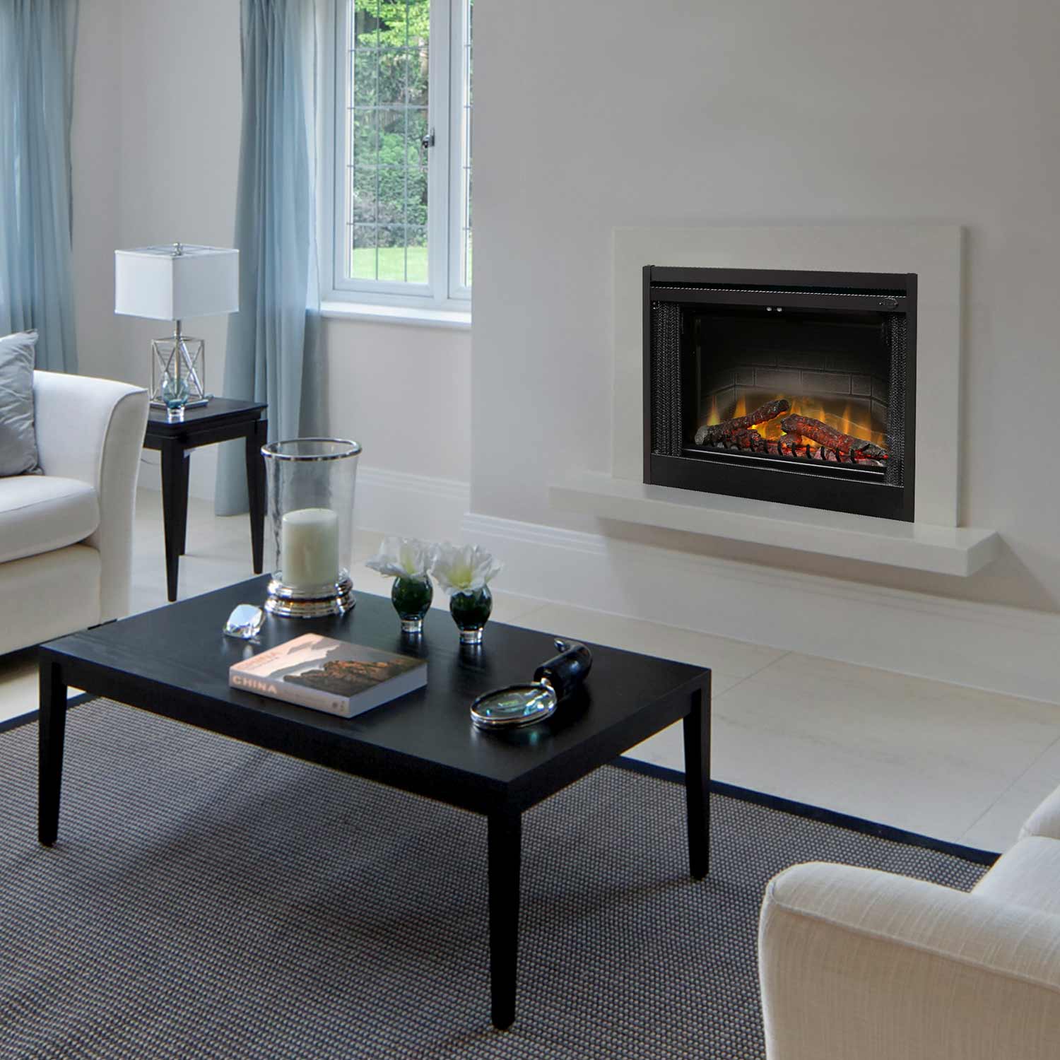 Electric fireplace insert set into a white wall with black frame and flame display