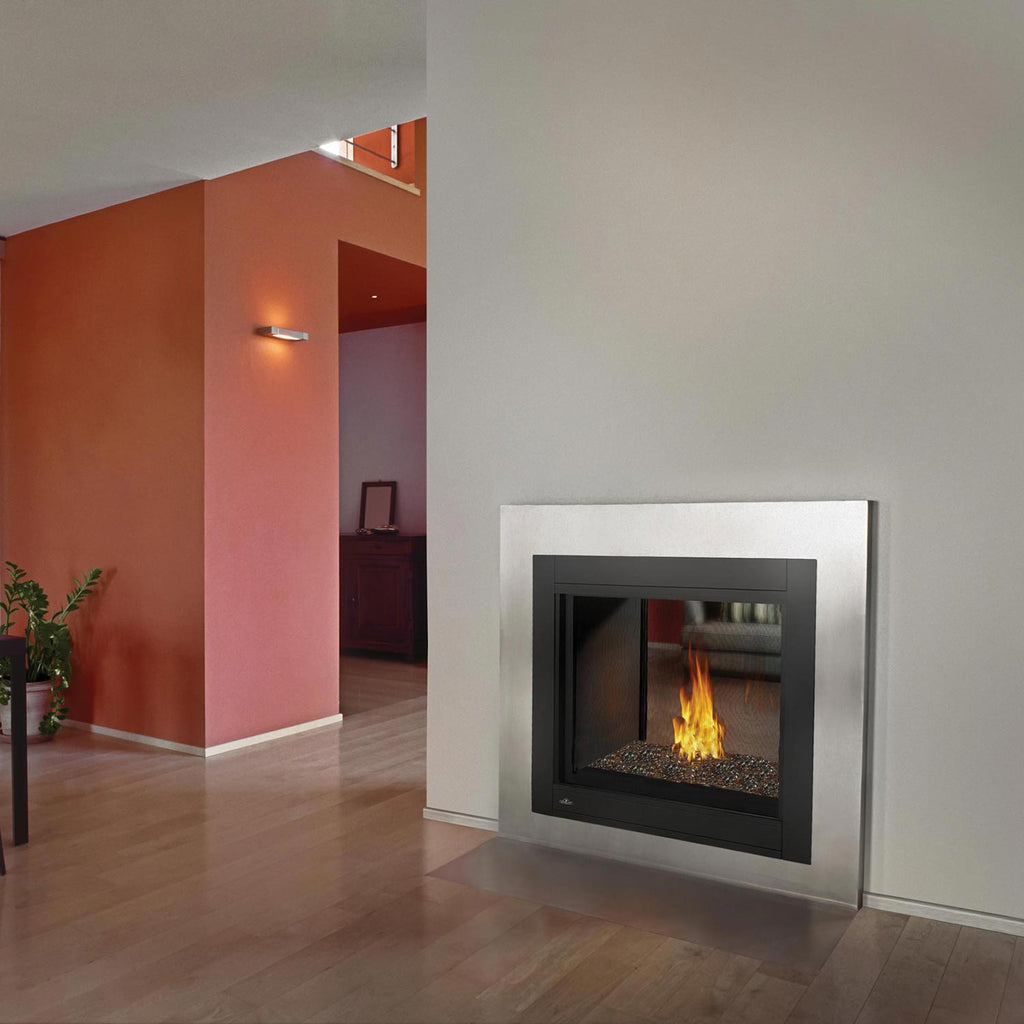 Black square direct vent gas fireplace with visible flame in a room setting