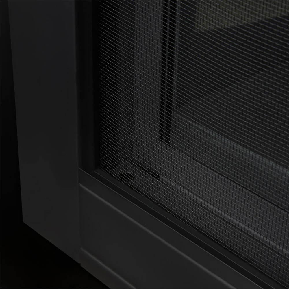 Direct-vent gas fireplace safety mesh barrier and black side panel detail
