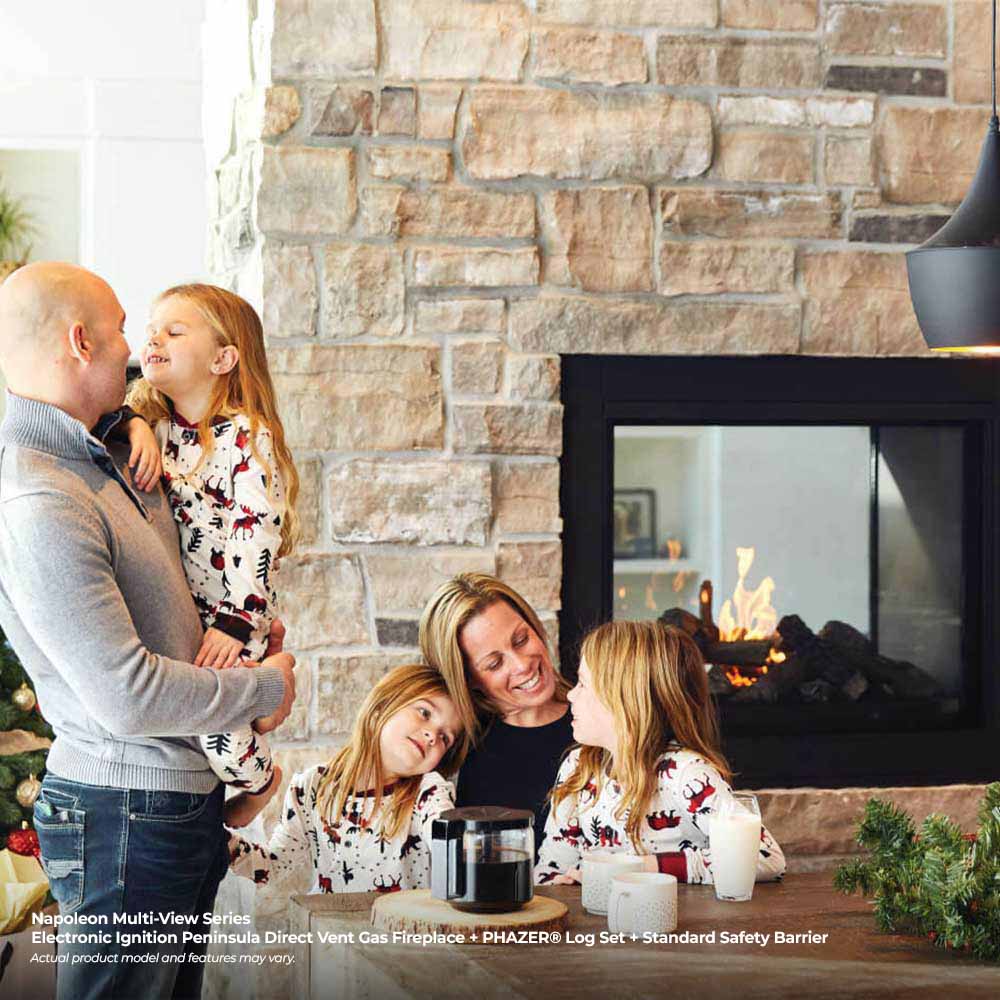 Multi-view direct-vent gas fireplace set in a stone wall with burning firebox