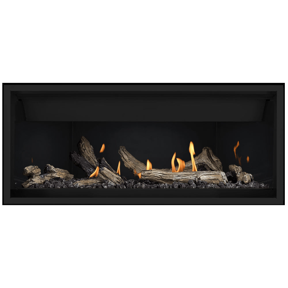 Black linear gas fireplace with charred logs, ember bed, and small flames