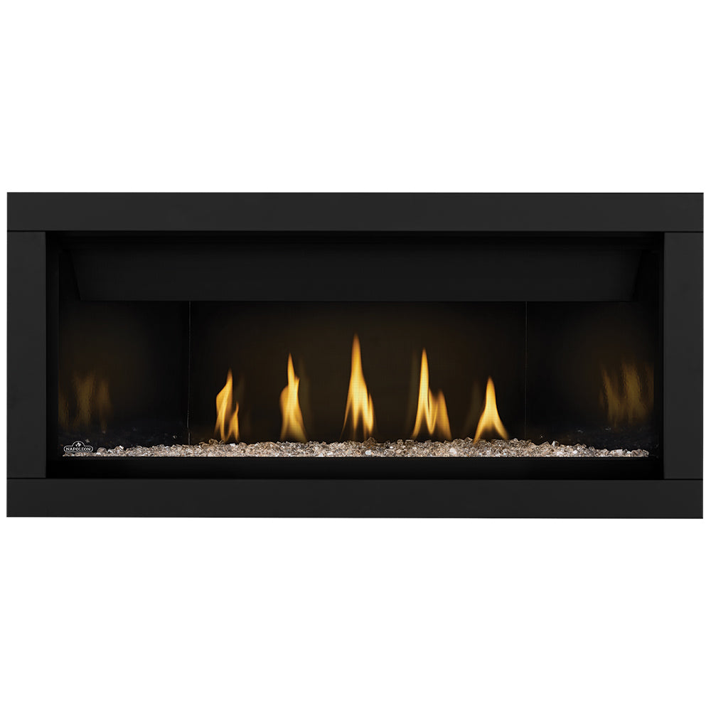 Direct vent gas fireplace with glowing orange flames and light gray glass embers base