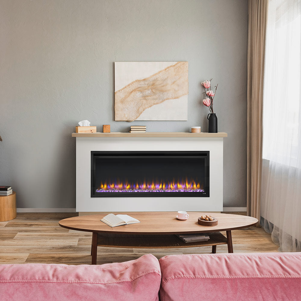 Electric fireplace mantel package with dark firebox and light gray mantle, light wood shelf