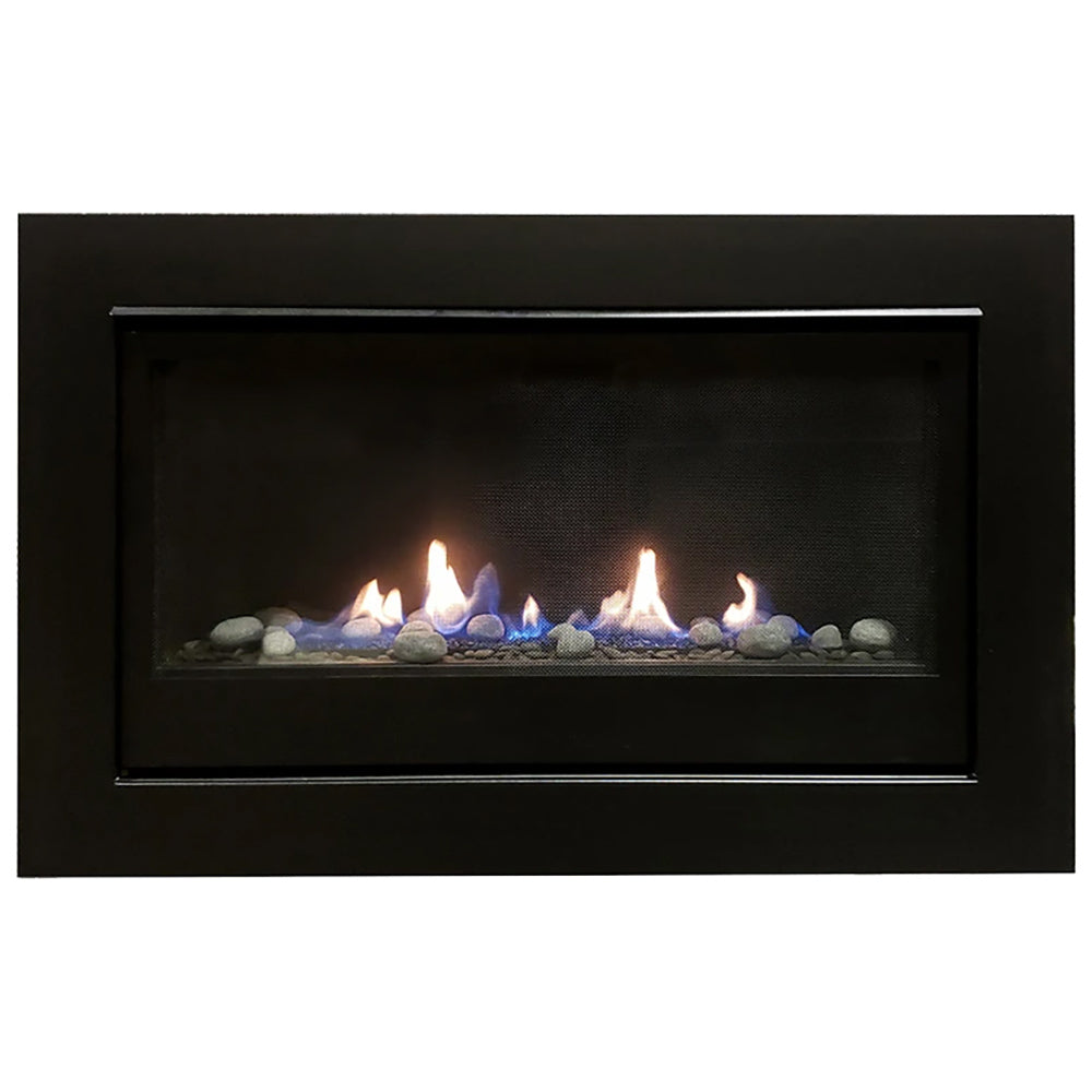 Black built-in gas fireplace with lit flame and pebble fire media behind glass