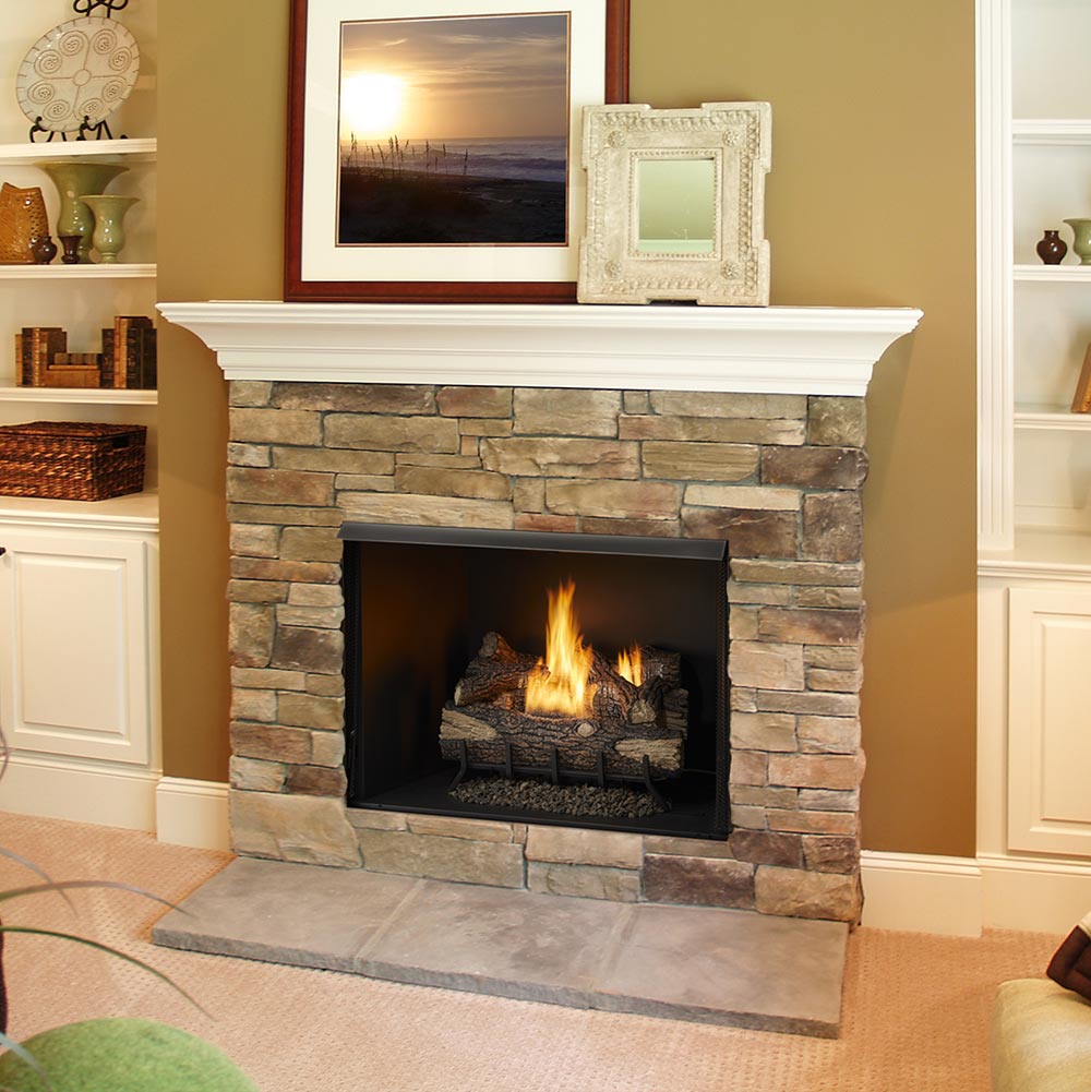 Stone fireplace with vent-free firebox and burning gas logs, black viewing window