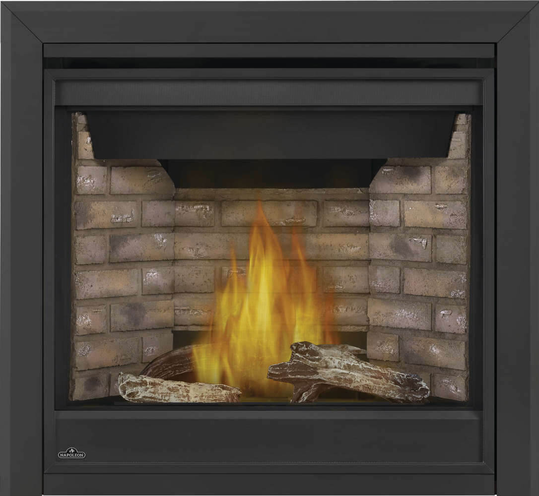 Black direct vent gas fireplace with glass front, flames, and tan brick back panel.