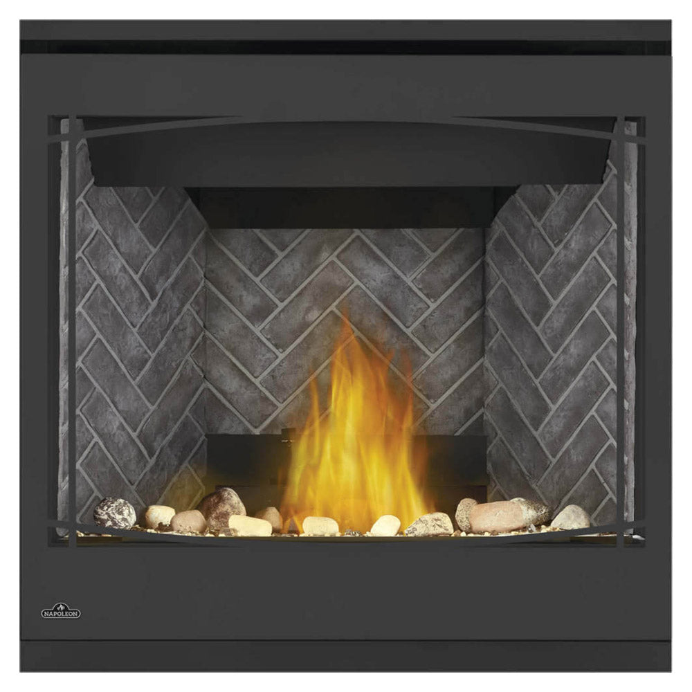 Black direct vent gas fireplace with glass front, burning logs, and gray stone back panel.