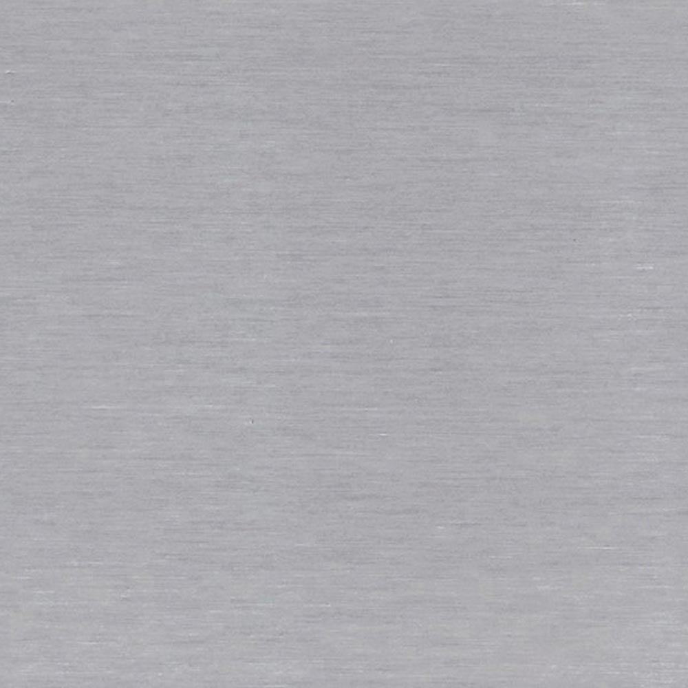 Stainless steel fireplace liner, brushed metal surface close-up