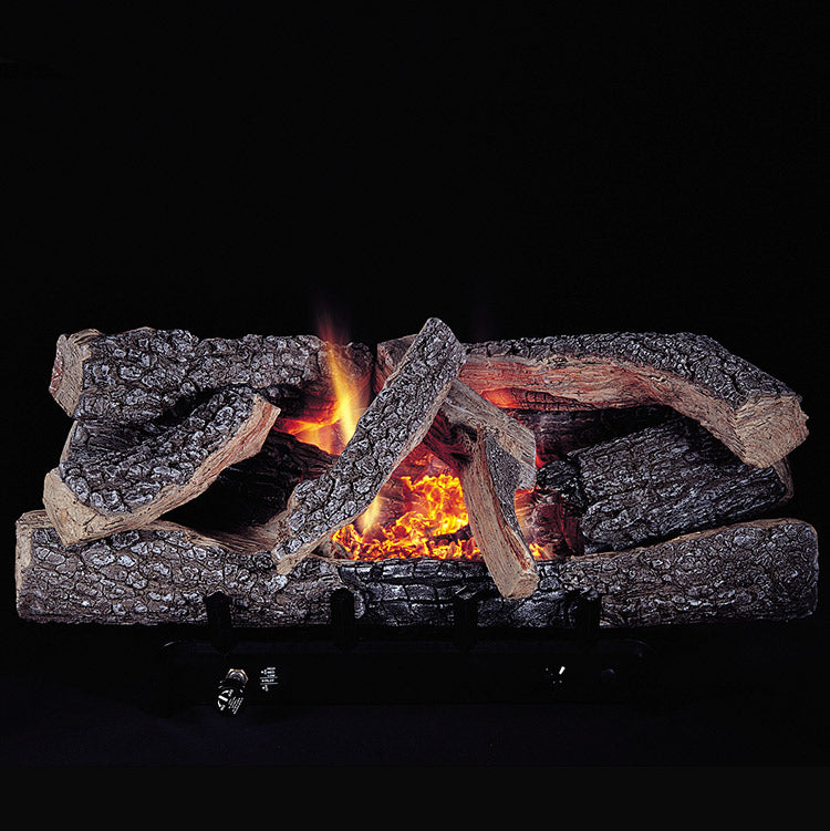 Ventless gas log set with glowing fire pit and burning charcoal logs
