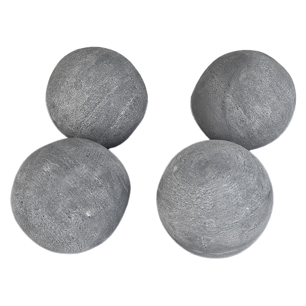 Grey fireplace cannon balls, four round stone-like spheres