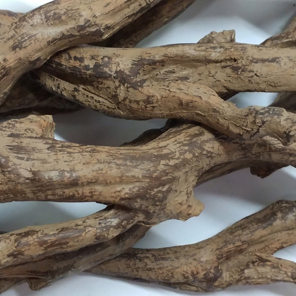 Driftwood-style decorative media pieces with weathered beige and brown texture