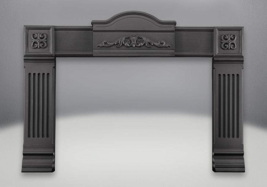 Black cast iron fireplace surround kit with ornate top and side pillars