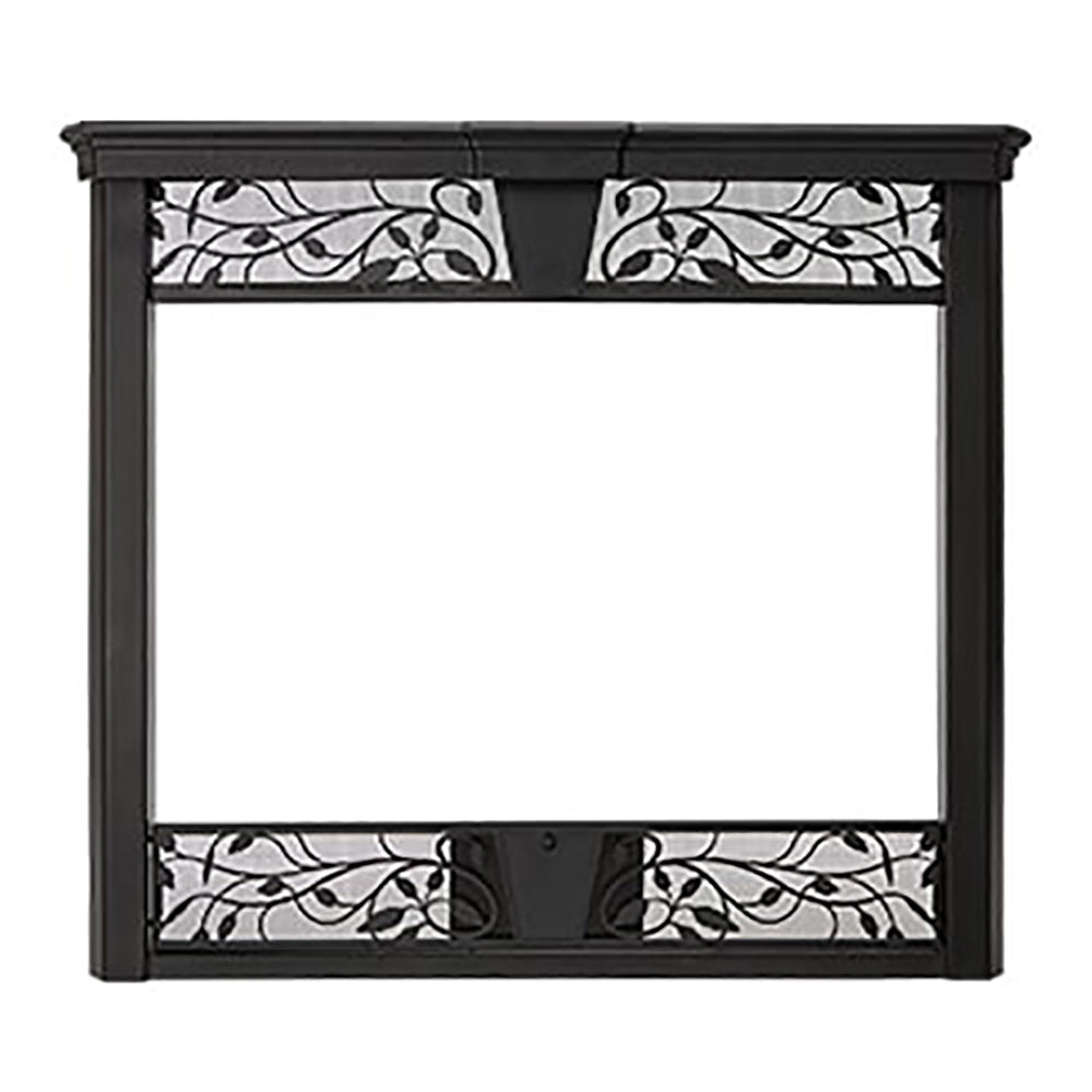 Black decorative fireplace front with ornate scrollwork panels and metal frame