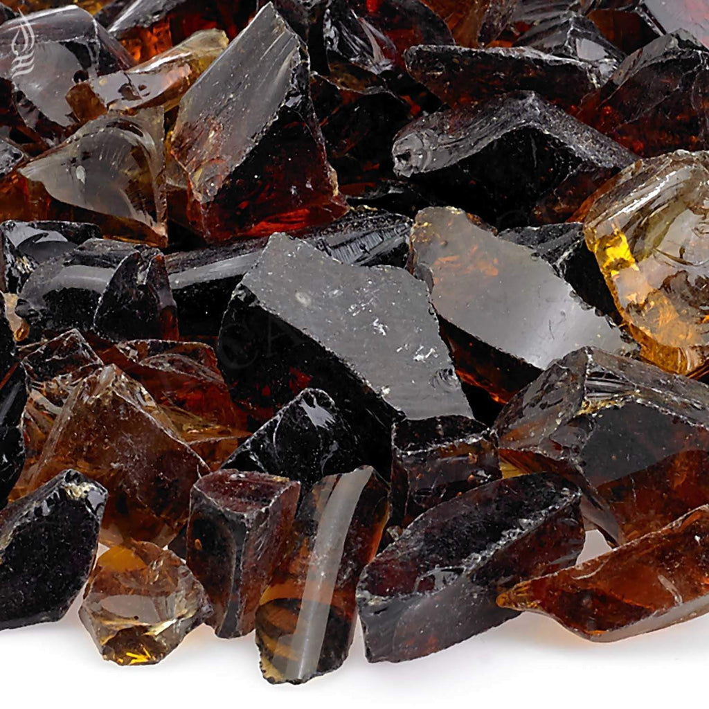 Recycled fire pit glass chunks close-up with dark red, black, and clear highlights