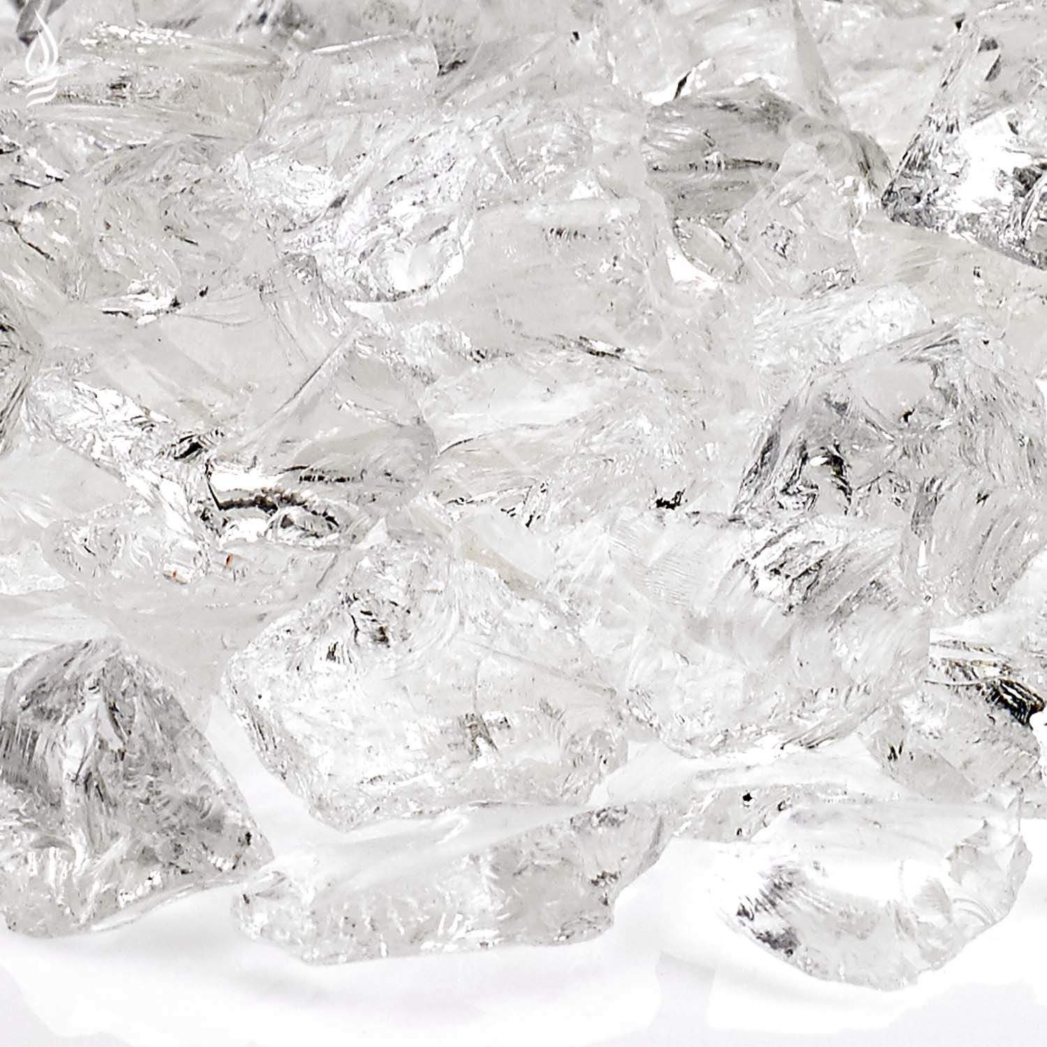Close-up of clear ice fire glass fragments with shiny facets