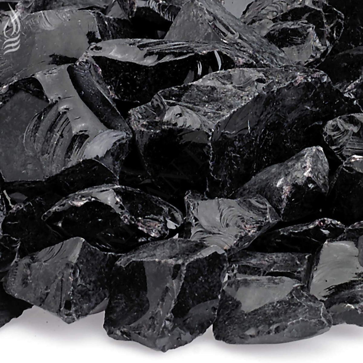 Close-up of onyx recycled fire glass pieces, glossy dark black