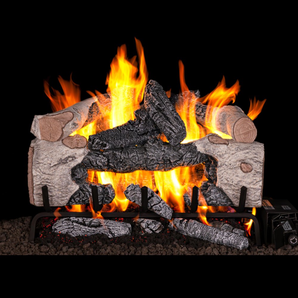 Vented gas log set with charred cinder birch logs and bright flames