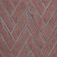 Red herringbone decorative brick panels with angled brick pattern