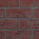 Red brick decorative panels with stacked rectangular blocks and mortar joints